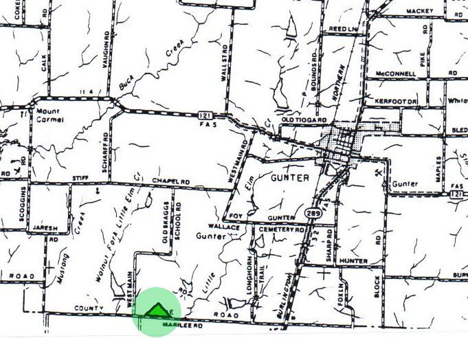 Black-and-white map of an 88-acre plot of land highlighted by the color green